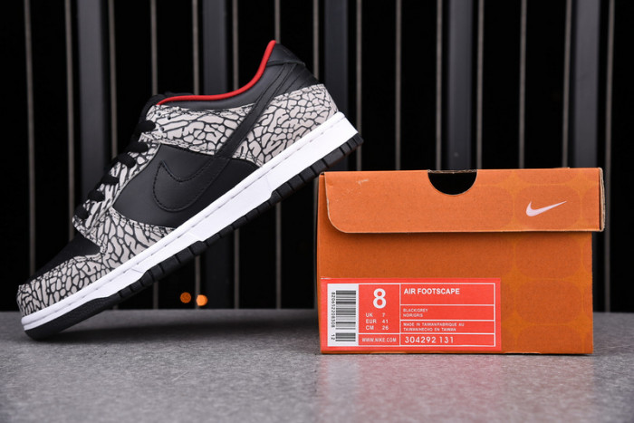 nike dunk sb low s*upre*me black cement 304292-131